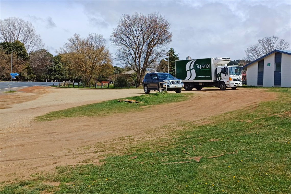 Current gravel parking area and toilet block off of Snowy Mountains Highway in Adaminaby