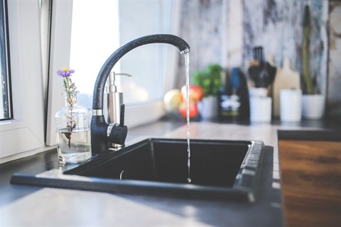 Water running from a kitchen tap