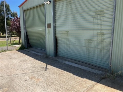 Damage to the roller doors at Michelago Bank of Bins